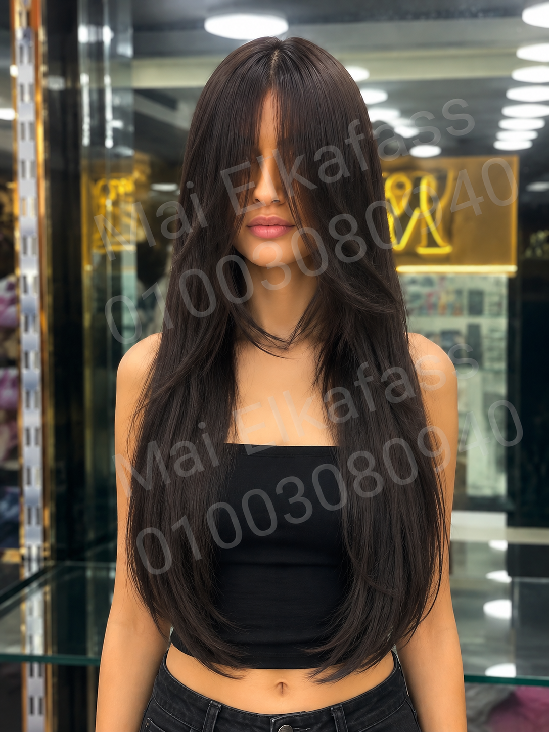 باروكه اسود باهت نص الضهر ليس باوصه طويله